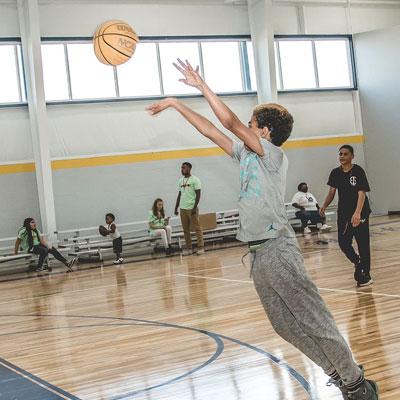 Boy Shooting Basketball